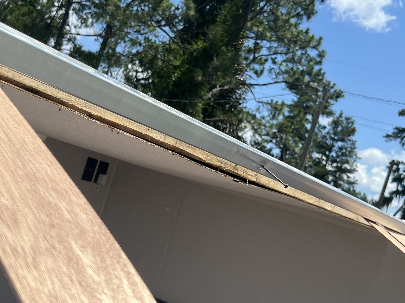 RV roof vent and sealant repair supplies on roof