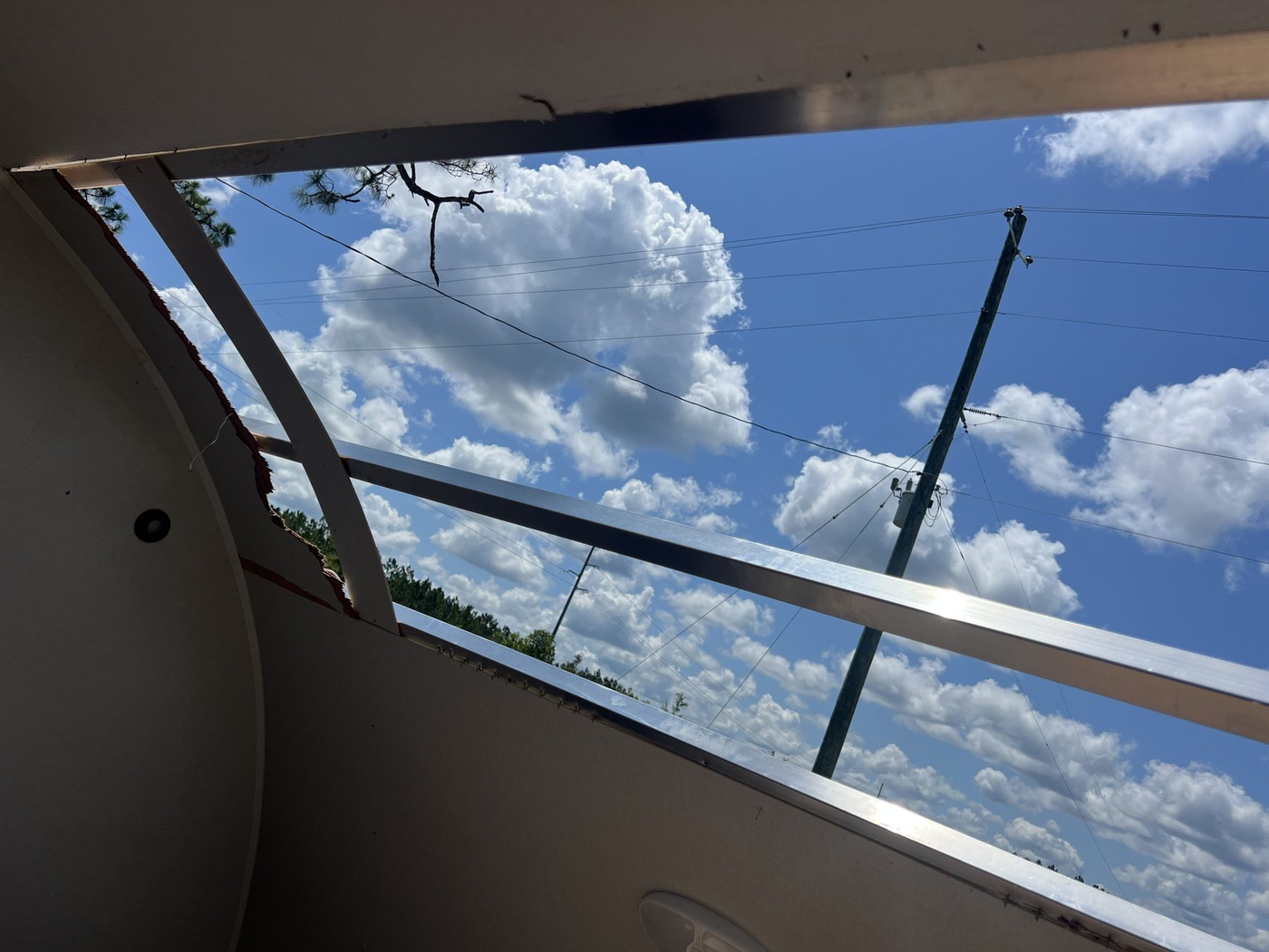 RV skylight and roof sealant repair close up